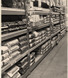 Retail shelves stocked with bagged feed